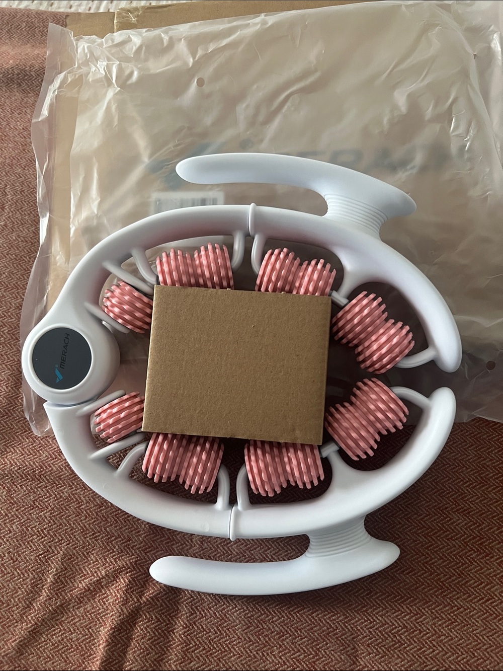 Handheld Pink Foot and Leg Massager with White Frame
